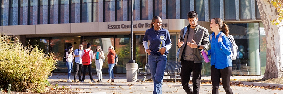 Group of students walking in front of building