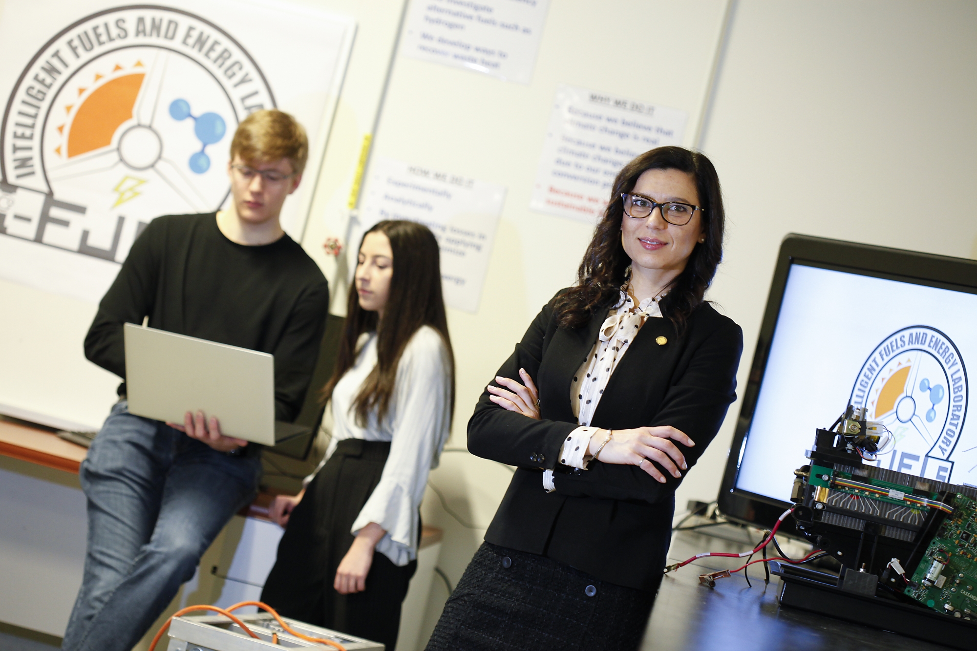 Peter Kriemadis, Dr. Ofelia Jianu and Team Member